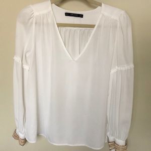 White blouse with sleeve detail